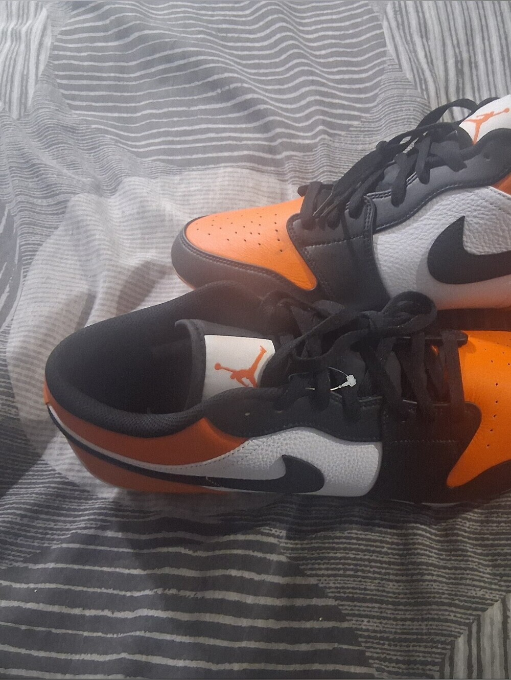 Jordan Shattered Backboards Men’s Low-Top Cleats in Orange, Black & White